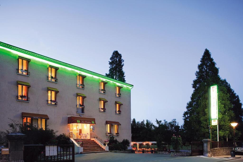 Logis Hotel Restaurant Les Cedres Joyeuse Exterior foto